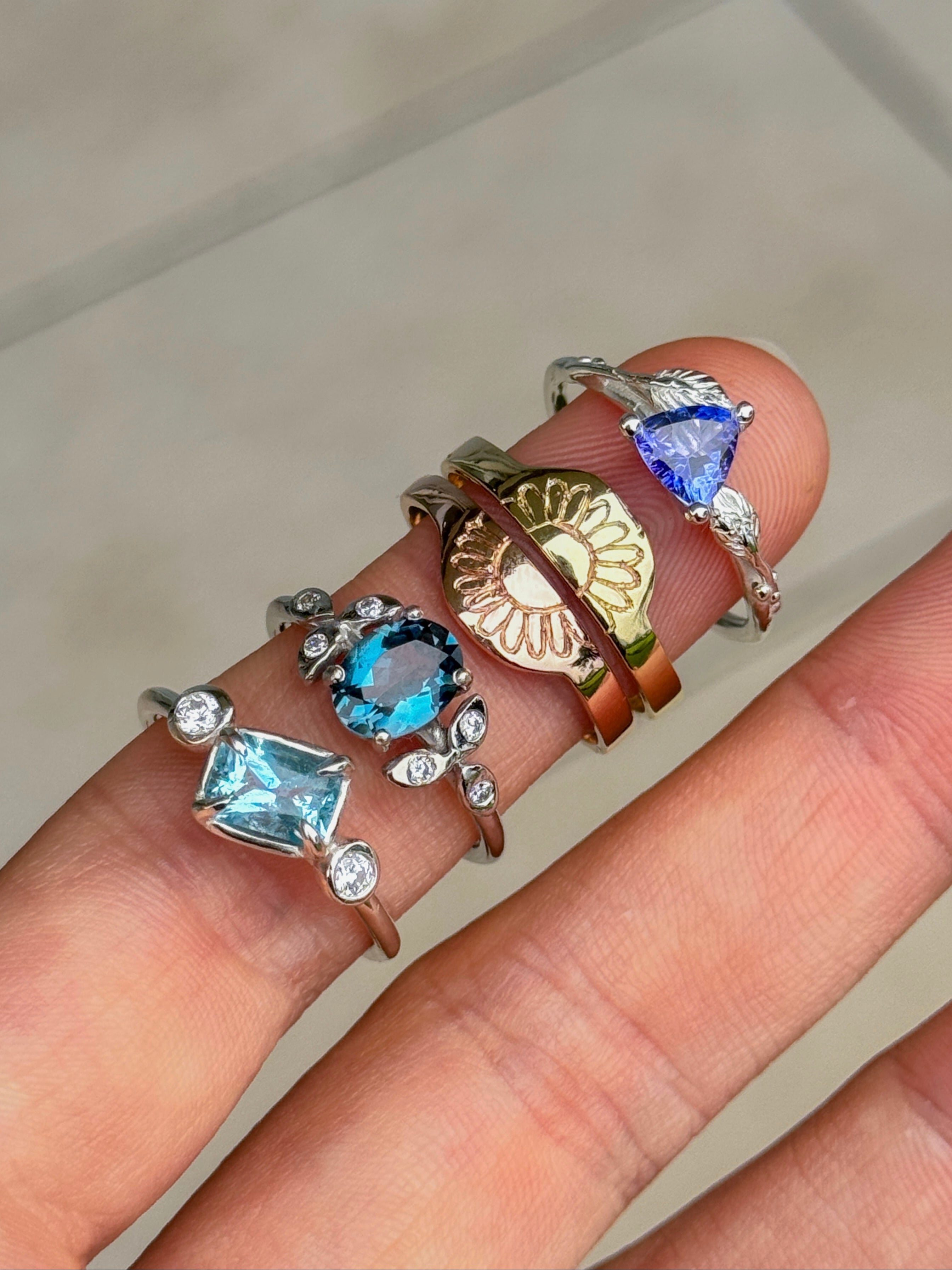 Aurora Bariletti gioielli personalizzati su misura anelli oro e argento pietre laboratorio orafo riva del garda